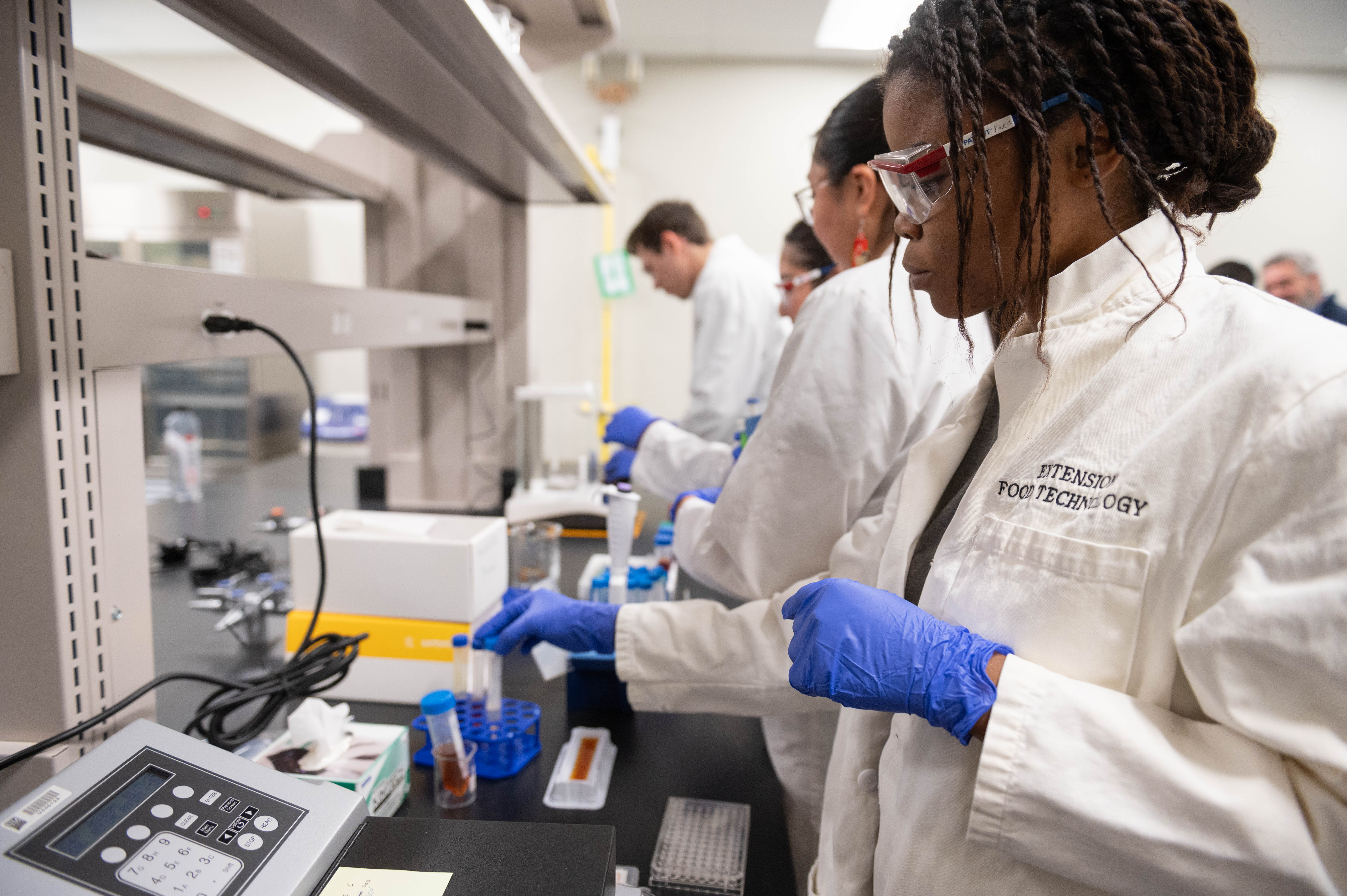 Students using the lab in the new Food Safety Science building.